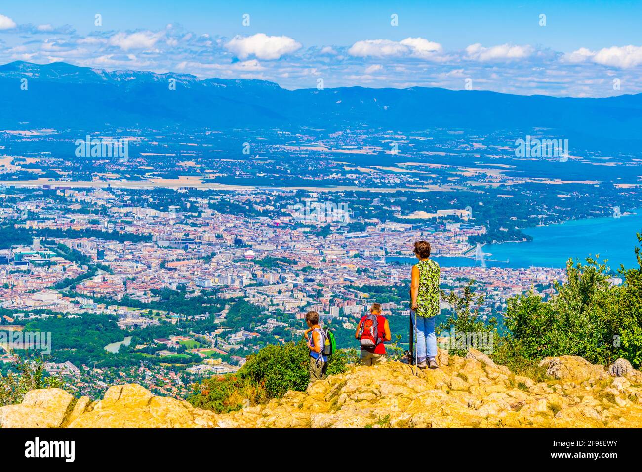 Three adults are overlooking Geneva from Mont Saleve, Switzerland Stock  Photo - Alamy