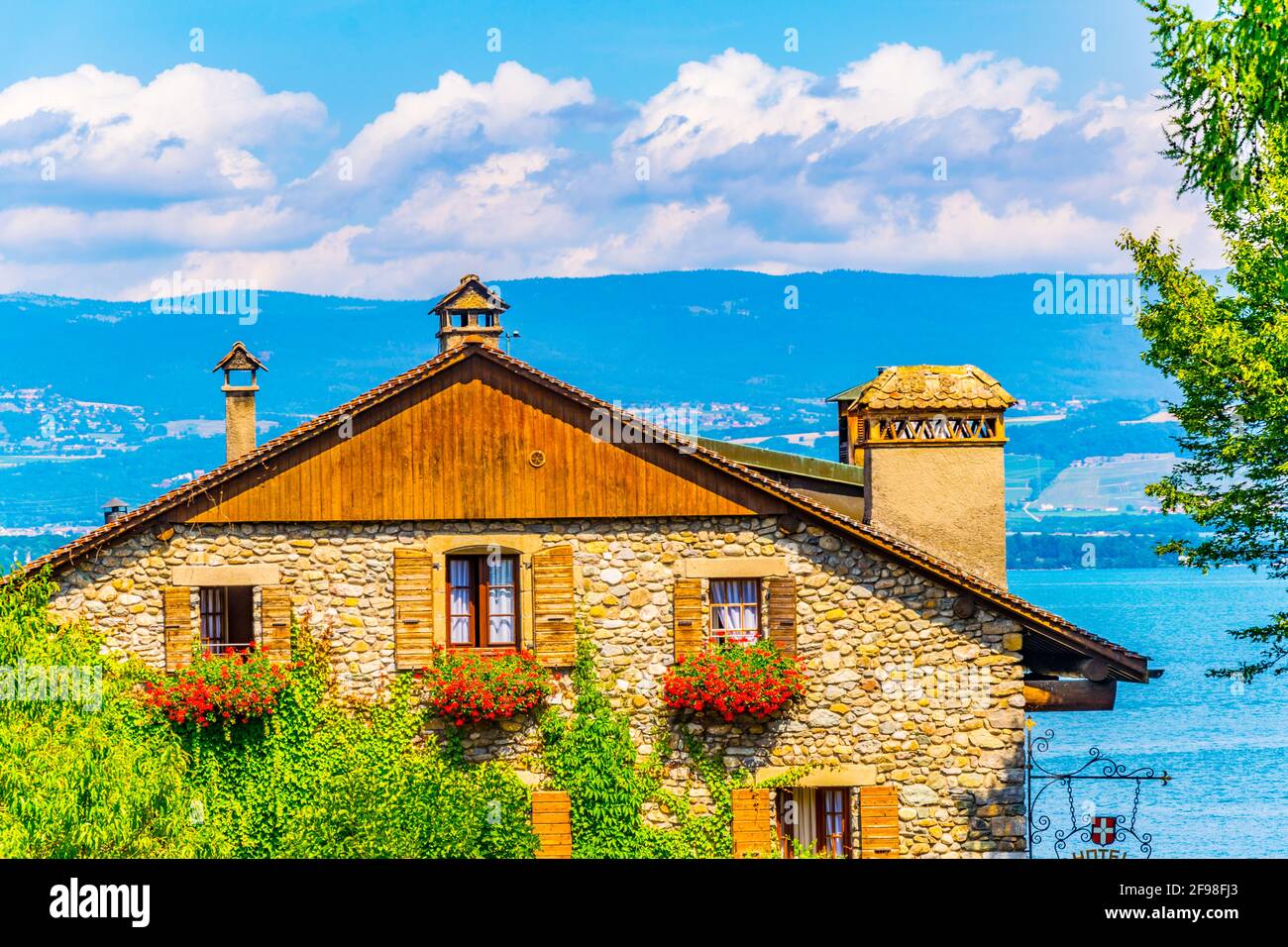 Traditional houses in Yvoire covered with ivy, France Stock Photo Alamy
