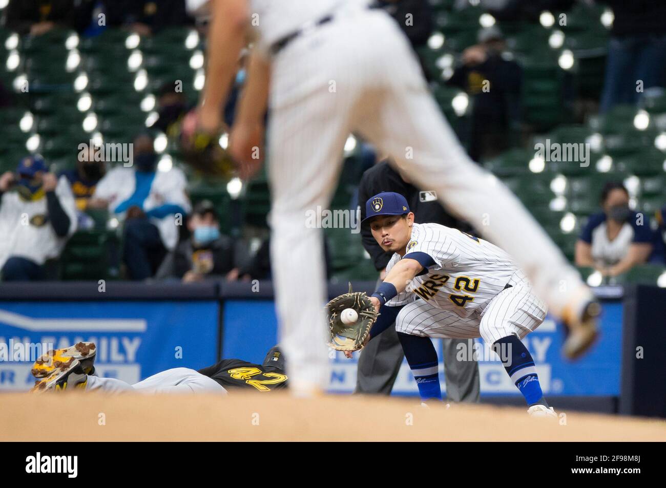 April 16, 2021: Milwaukee Brewers Jace Peterson #14 races to the third base  on Jackie Bradley Jr. single in the 7th inning of the Major League Baseball  game between the Milwaukee Brewers