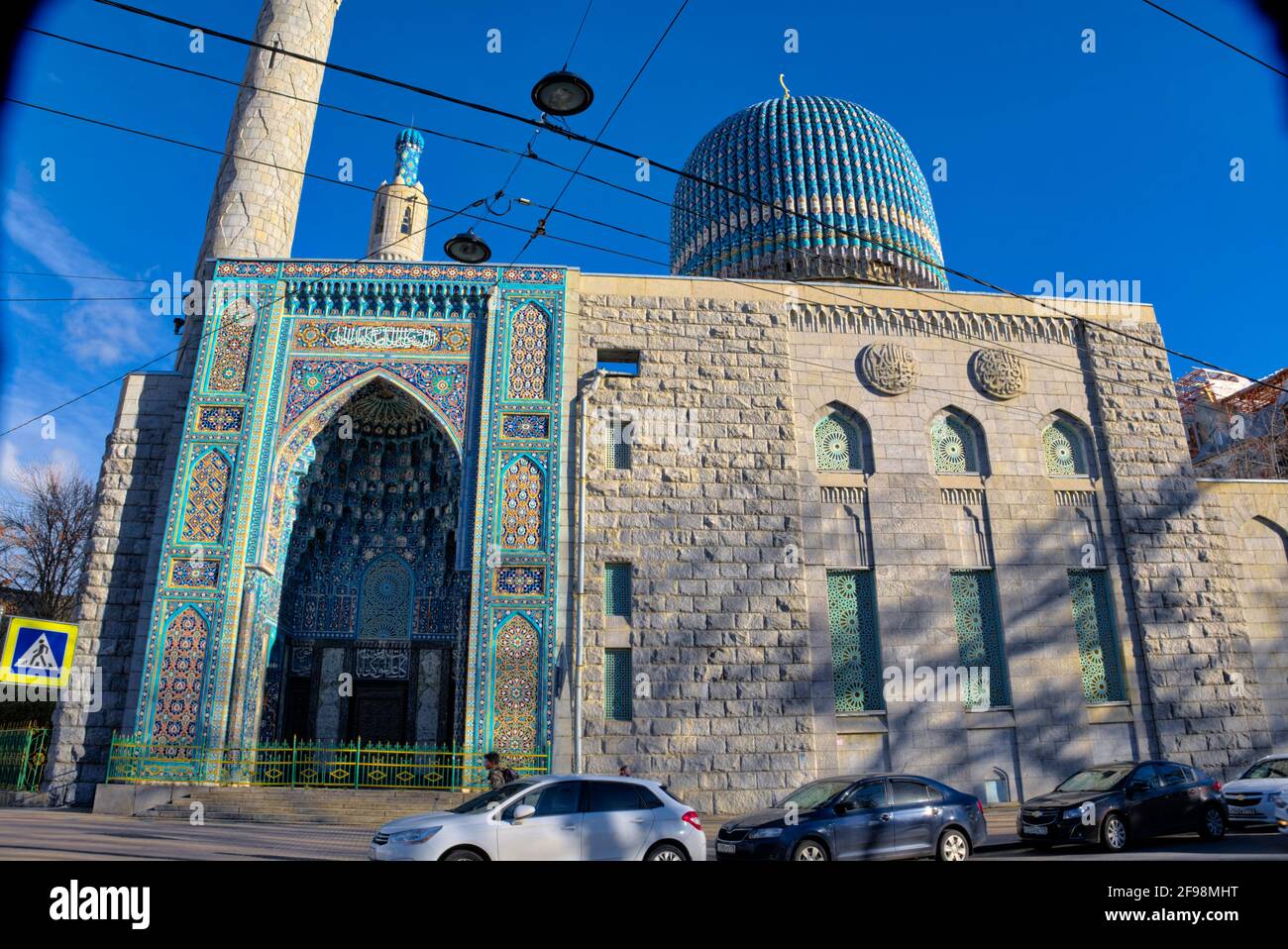 The facades are decorated with sayings from Koran using the characteristic Arabian calligraphy. Internal columns are made from green marble. The mosqu Stock Photo