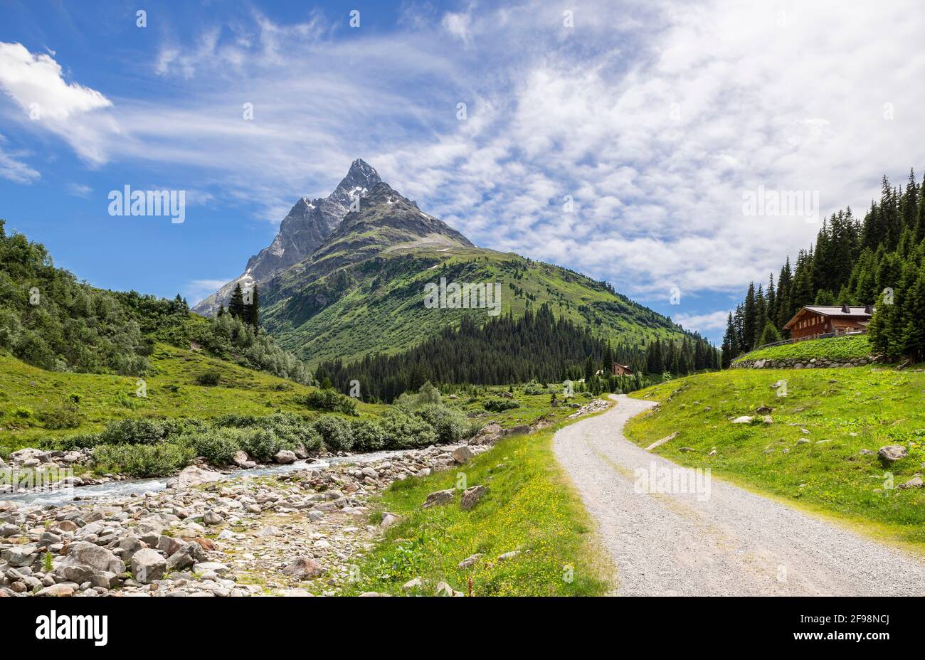 Alpine mountain landscape in the Rosanna valley near Sankt Anton on a sunny summer day. In the background the patteriol. Verwall, Tyrol, Austria Stock Photo