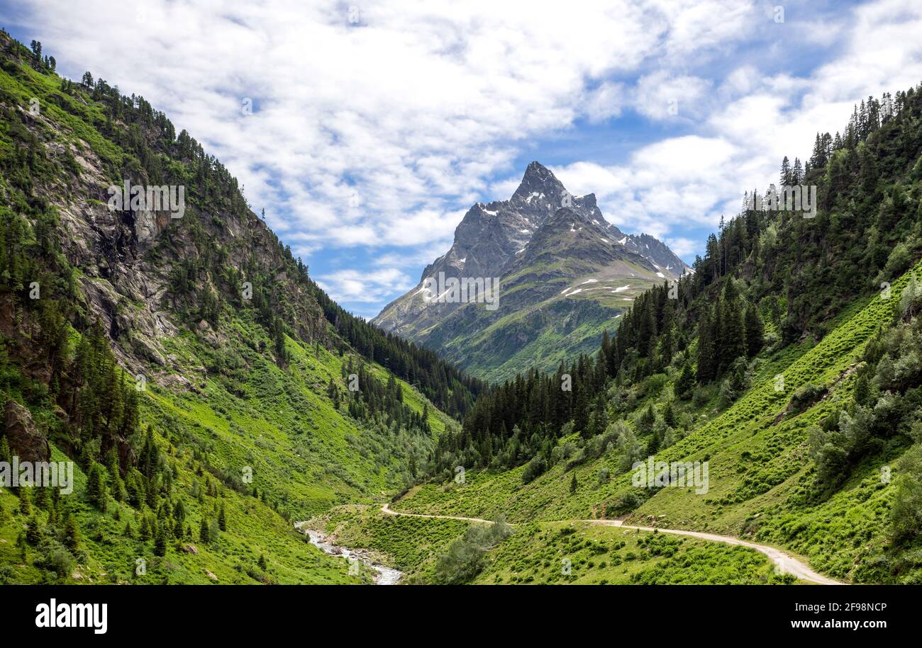 Wild mountain landscape in the Rosanna valley near Sankt Anton on a sunny summer day. In the background the patteriol. Verwall, Tyrol, Austria Stock Photo