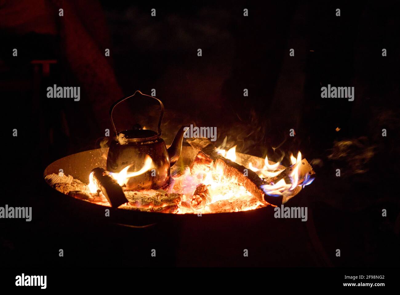 Fire, brazier, coffee pot Stock Photo Alamy