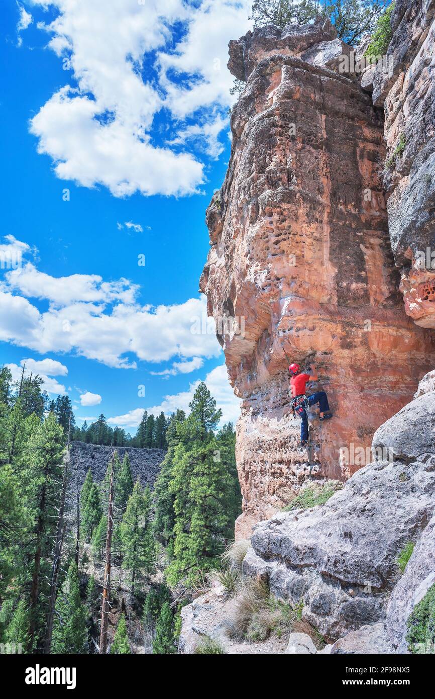Man rock climbing at 'The Pit' in Sandy's Canyon, Flagstaff, Arizona