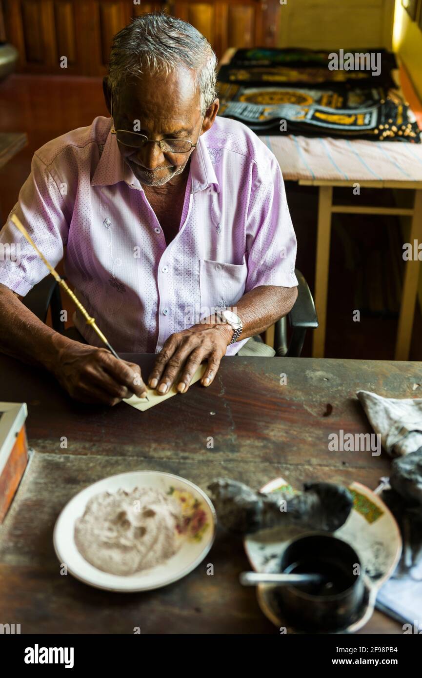 Sri Lanka, Matale, the cave monastery Aluvihara, senior, slip of paper, write, Stock Photo