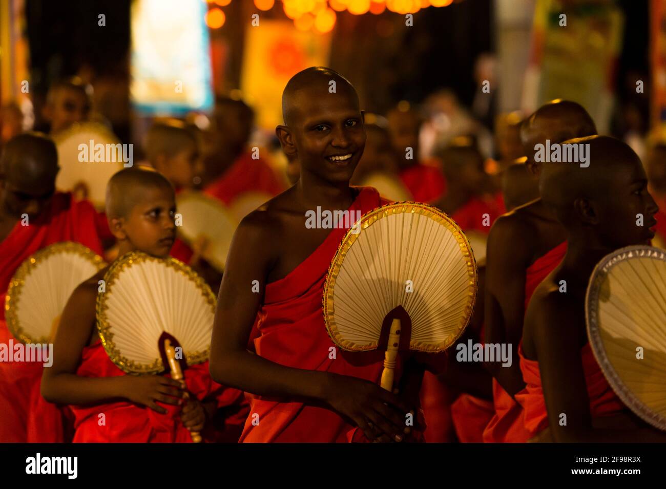 Sri Lanka, Colombo, Gangaramaya temple, the Nawam Maha Perahera festival, monks, fans, Stock Photo