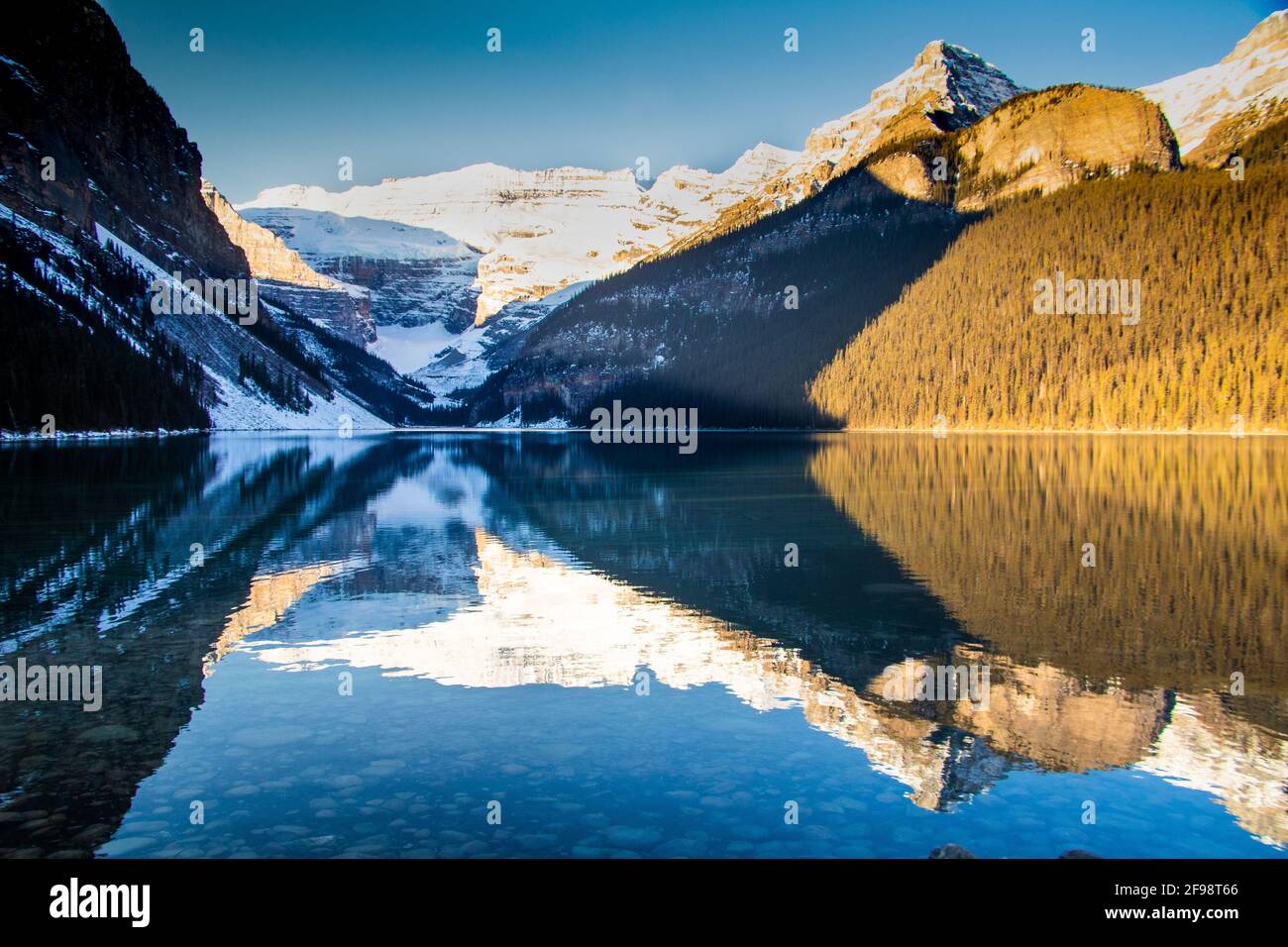 Winter sunrise over scenic Lake Louise in Banff National Park, Alberta ...
