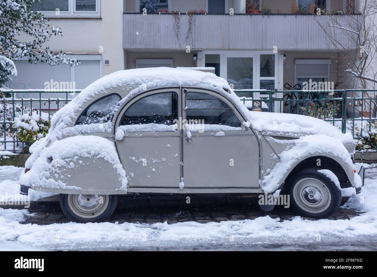 Snow-covered old-timer Citroen 2CV duck, Germany, Euriopa Stock Photo
