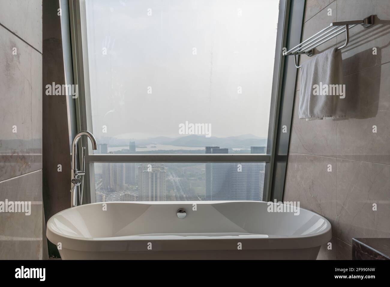 Modern luxury hotel bathroom and bathtub Stock Photo Alamy
