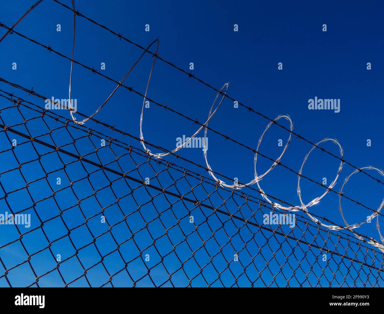 Femce with barb wire close up shot - USA 2017 Stock Photo