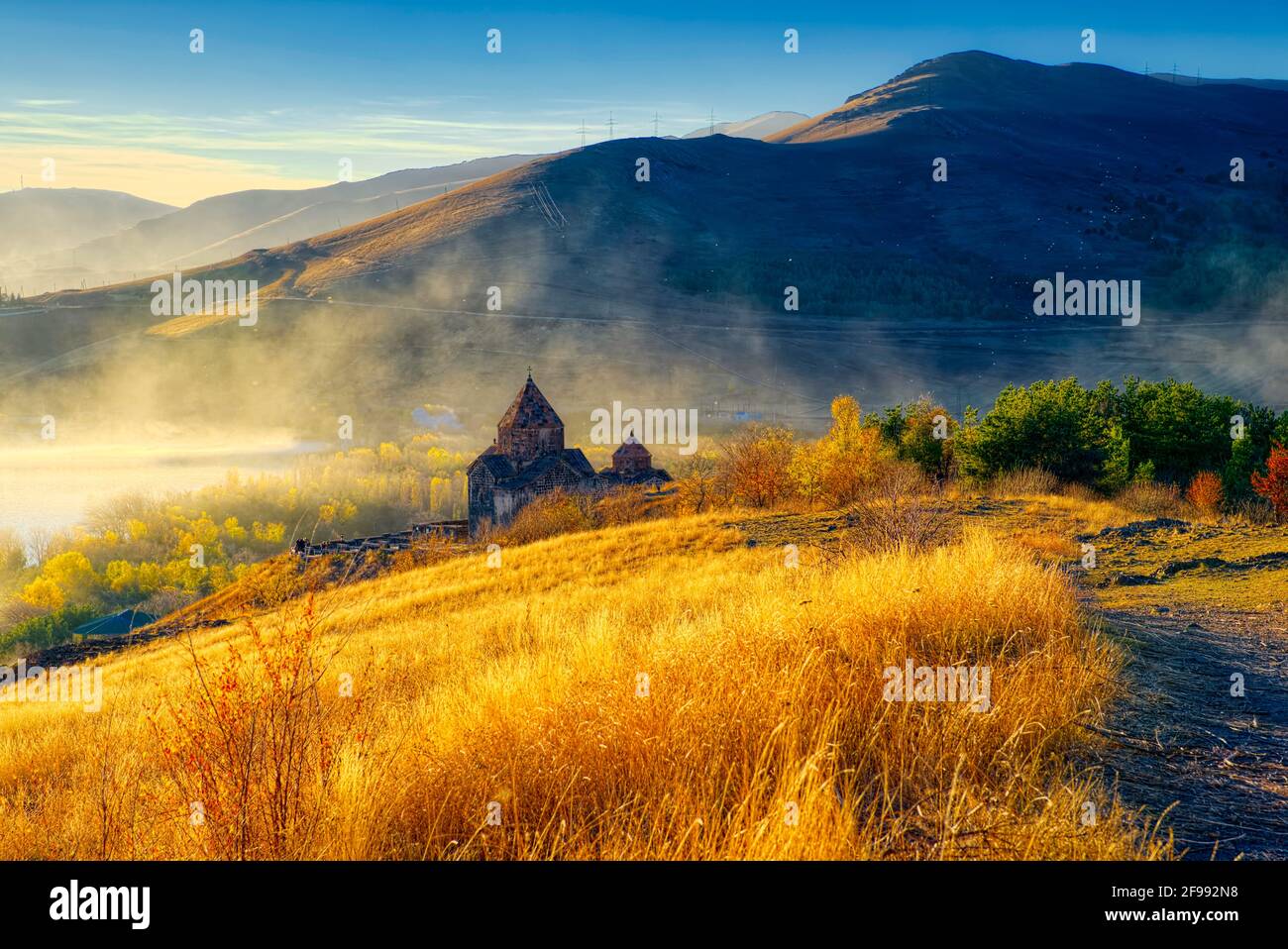 In the northwest part of Sevan Lake, on a narrow rocky peninsula, there stands one of the most prominent examples of medieval Armenian architecture – Stock Photo