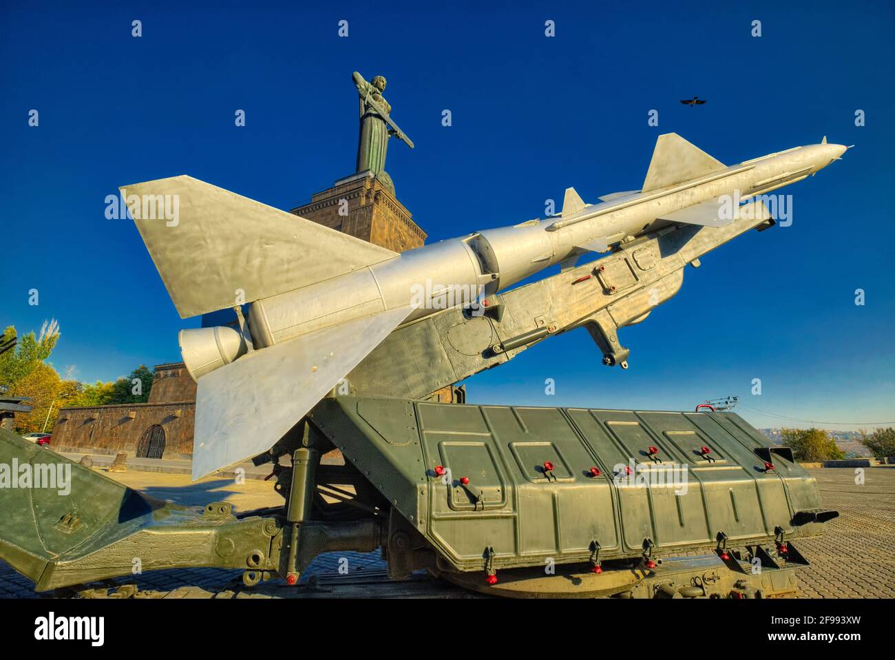 Rocket missile, Mother Armenia statue and military museum at Victory Park, Yerevan, Armenia  Taken @Yerevan, Armenia Stock Photo