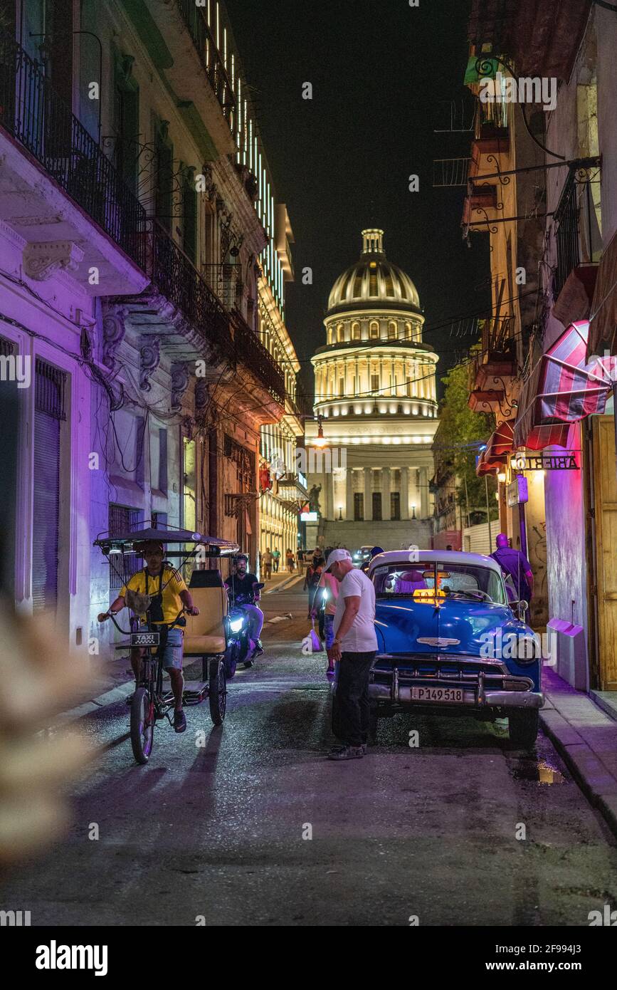 Street scene with the Capitol in the background in the Centro district, Havana Province, Cuba, Havana Province, Cuba Stock Photo