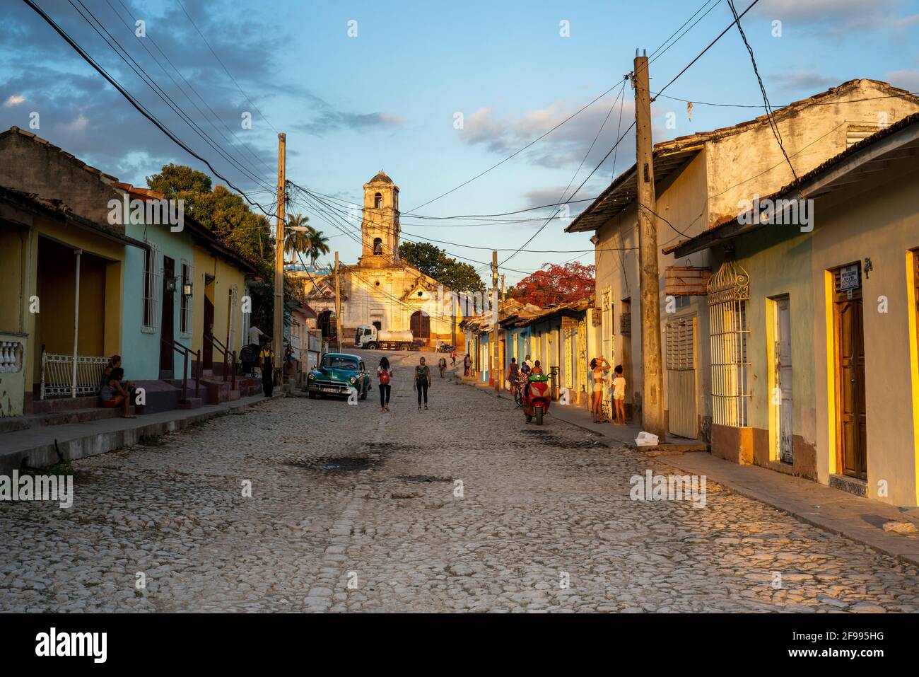 Street in Trinidad with Santa Ana Church, Spiritus Sancti Province, Cuba Stock Photo
