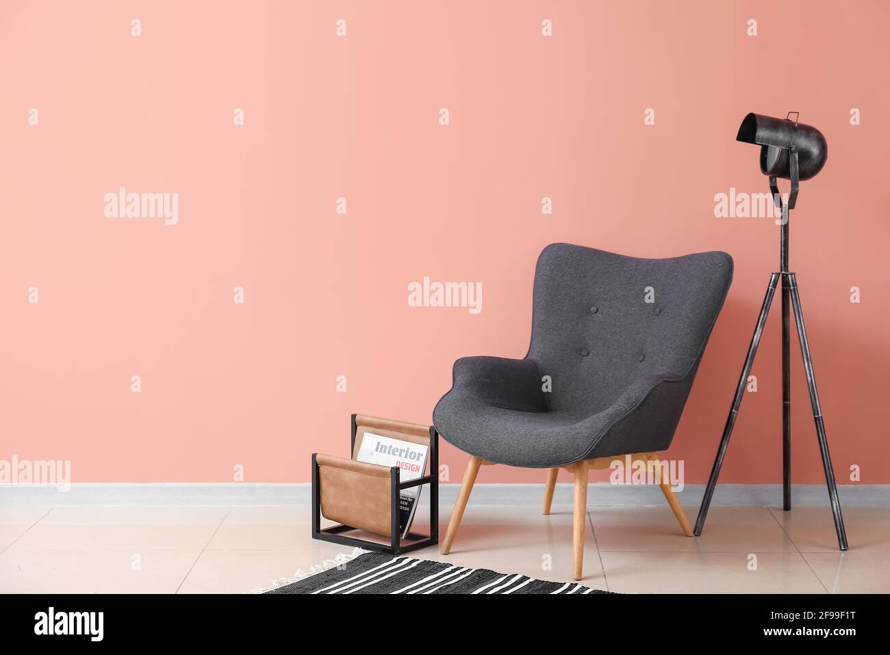 Armchair and lamp in interior of modern room Stock Photo - Alamy