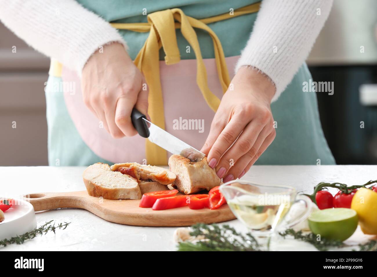 Woman kitchen cooked chicken fillet hi-res stock photography and images ...