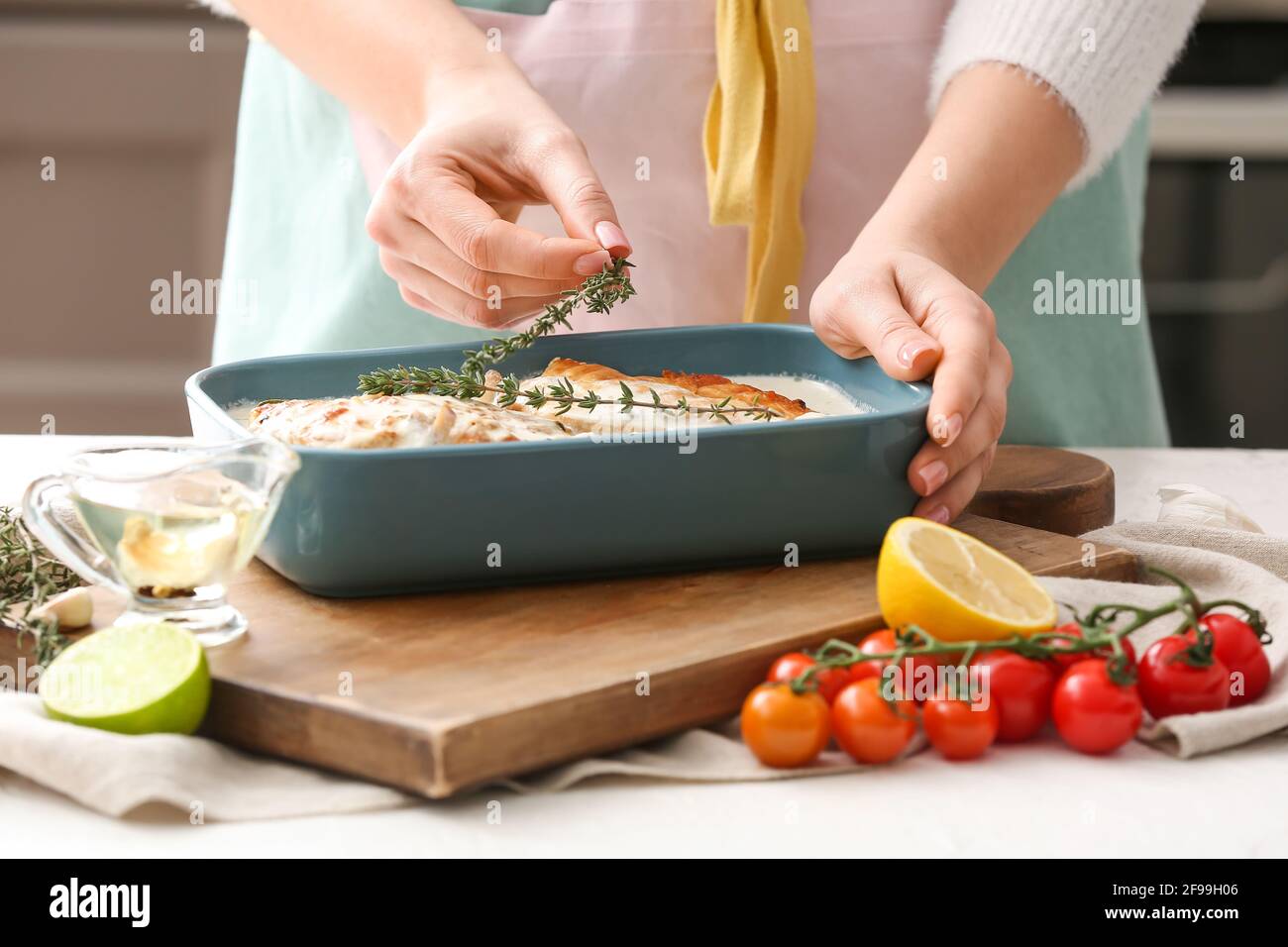 Woman kitchen cooked chicken fillet hi-res stock photography and images ...