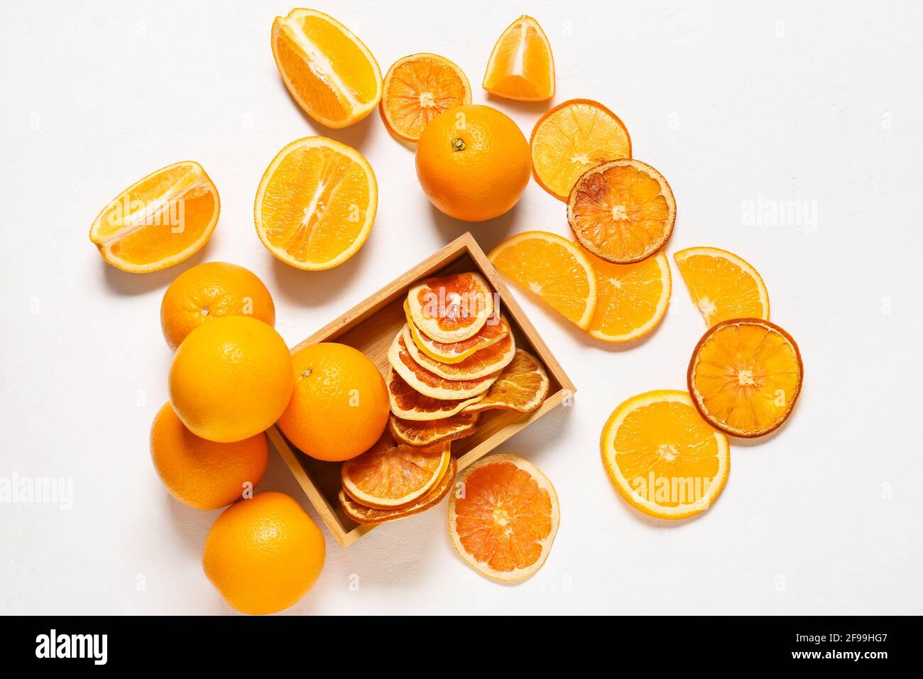 Box with oranges on white background Stock Photo - Alamy
