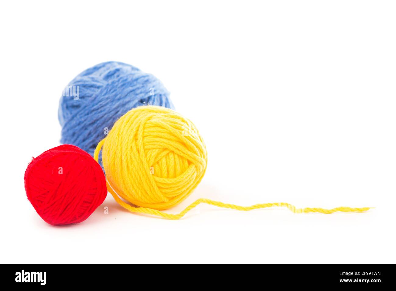 needles for knitting on the white background Stock Photo - Alamy