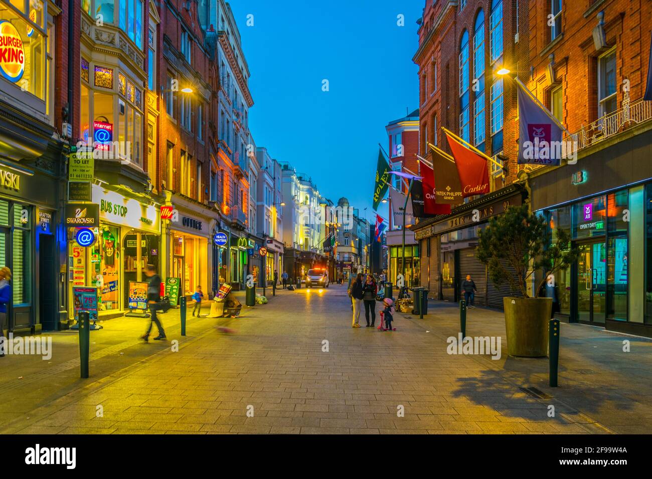 DUBLIN, IRELAND, MAY 9, 2017 night view of people strolling through a