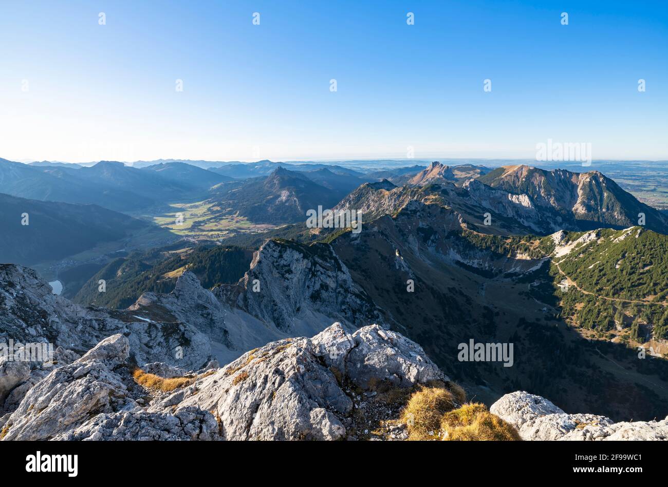 Alpine mountain landscape on a sunny autumn day. View from Gimpel to the mountains over the Tannheimer Tal with Aggenstein and Füssener Jöchle. Allgäu Alps, Tyrol, Austria, Europe Stock Photo