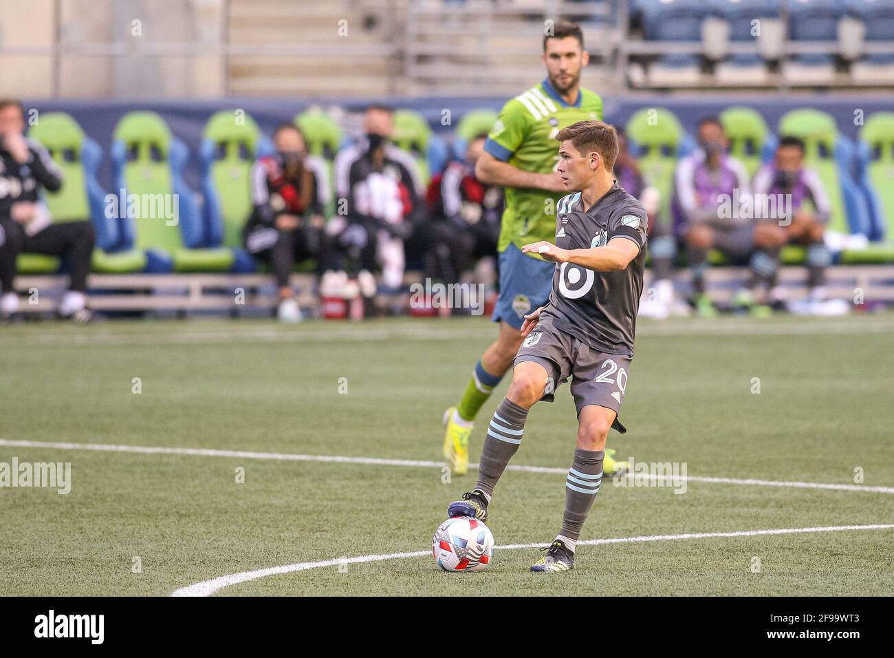Minnesota United FC midfielder Wil Trapp (20) with the ball against the Seattle Sounders FC during the first half of an MLS match at Lumen Field, Frid Stock Photo