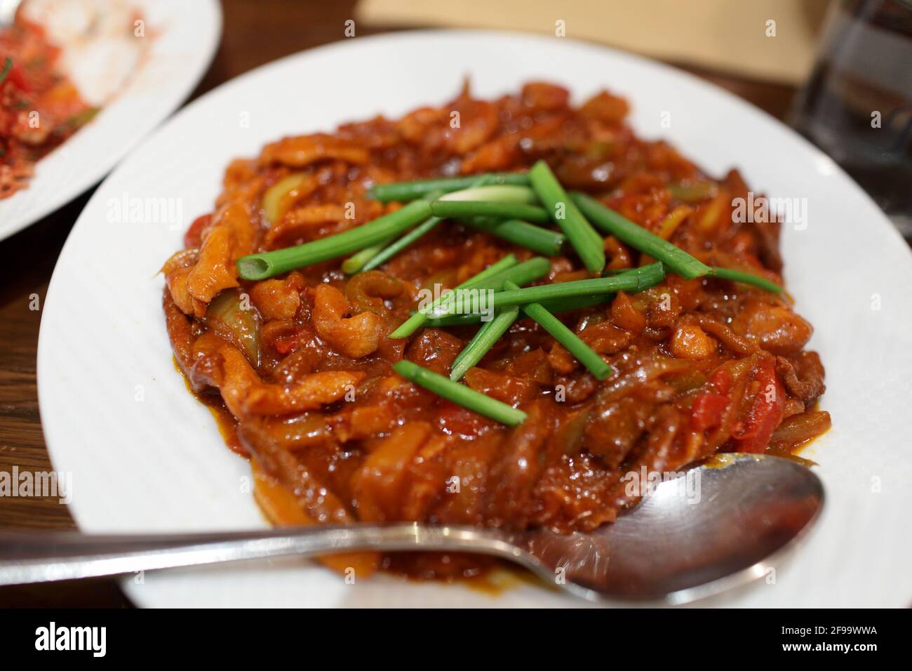 Beef stew on a white plate in an armanian restaurant Stock Photo