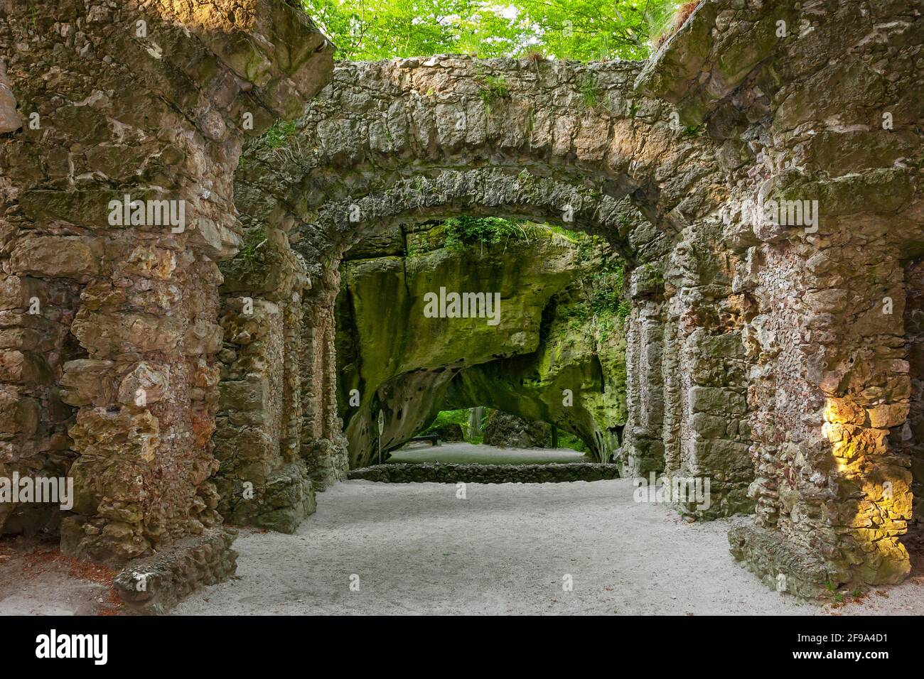 Germany, Bavaria, Wonsees-Sanspareil, ruin theater with a view of the Kalypsogrotto in the 'Felsengarten Sanspareil'. The listed English landscape garden was laid out in the 18th century under Margrave 'Friedrich von Bayreuth' and his wife Margravine 'Wilhelmine von Bayreuth'. Stock Photo