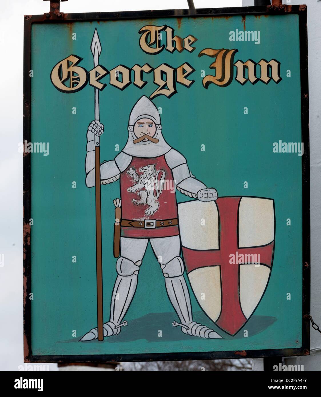 Traditional hanging pub sign at The George Inn, Felpham Road, Bognor Regis, West Sussex, England, UK Stock Photo