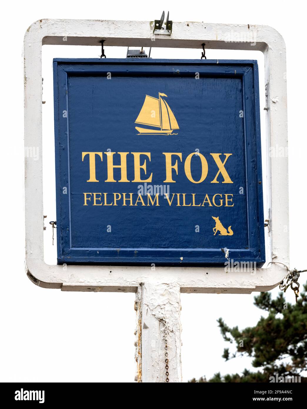 Traditional hanging pub sign at The Fox public house, Waterloo Road, Felpham, West Sussex, England, UK Stock Photo