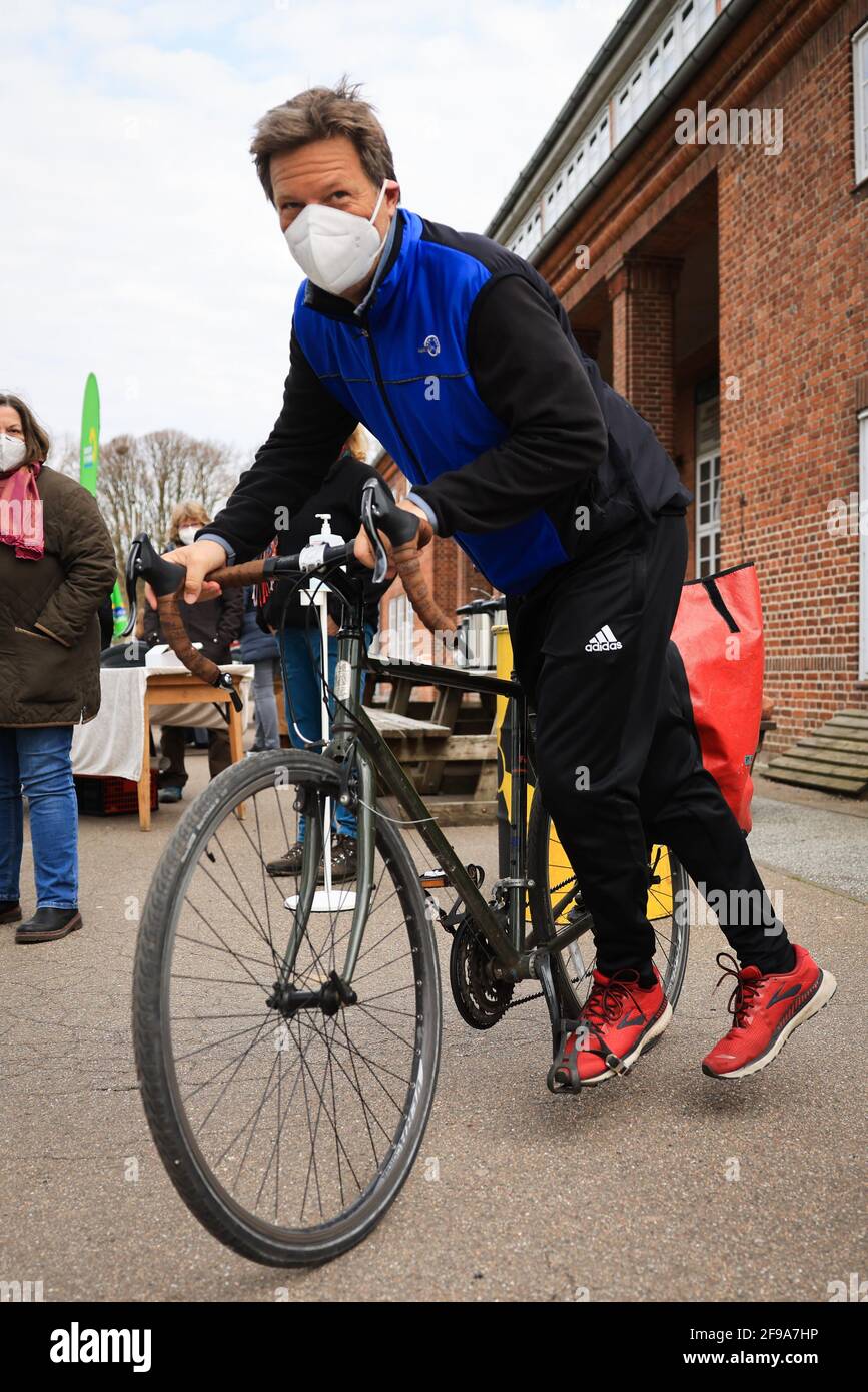 Steinbergkirche, Germany. 17th Apr, 2021. Robert Habeck, federal chairman  of Bündnis 90/Die Grünen, is coming by bicycle to a members' meeting of the  Green Party for the election of the direct candidate