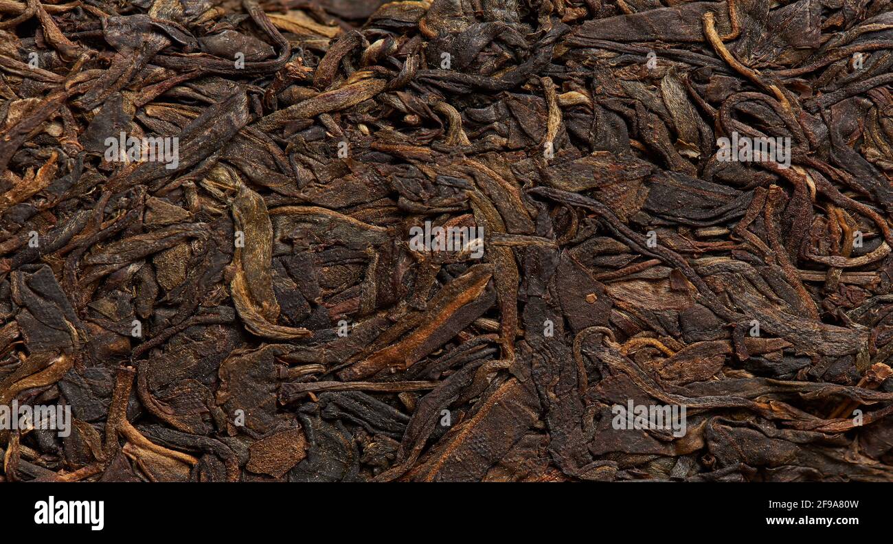 Texture of packaged tea leaves as a background. Stock Photo
