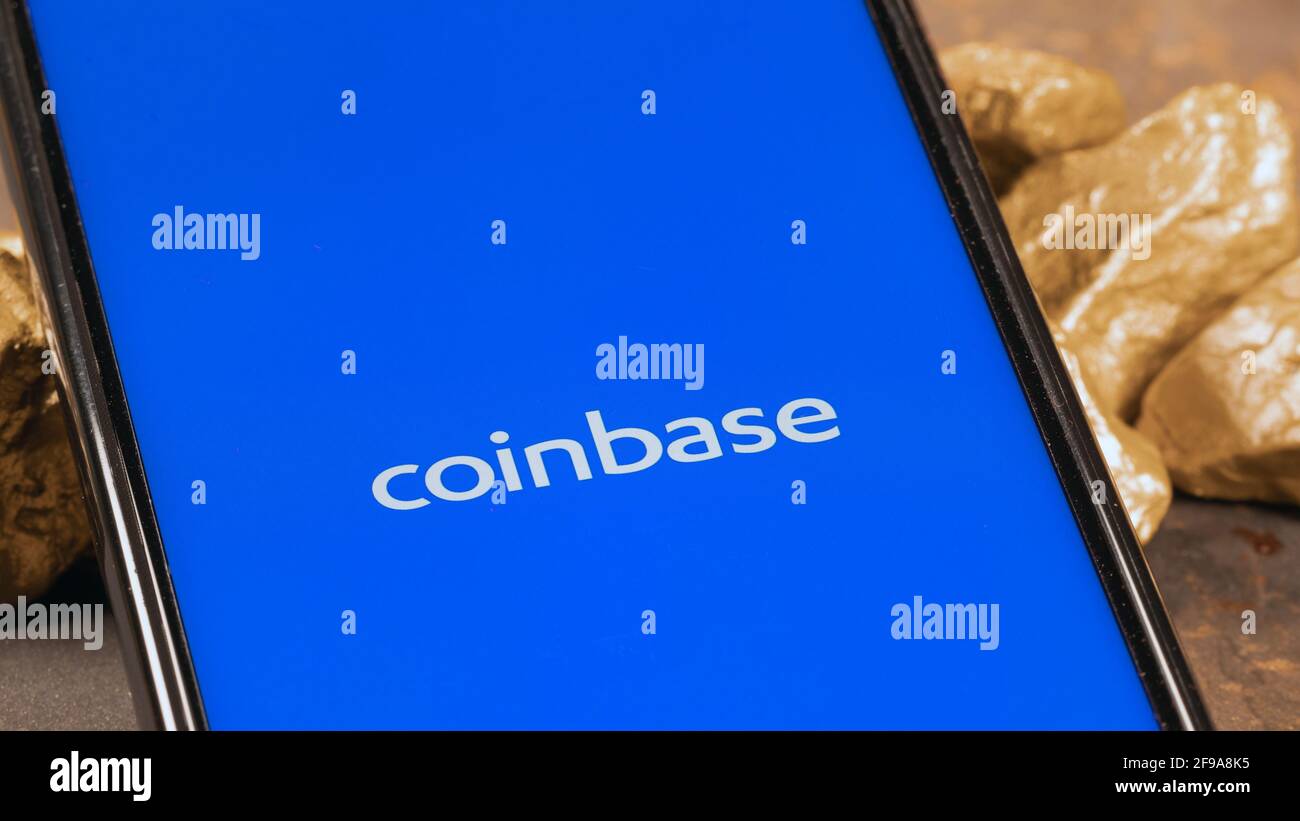 Coinbase crypto exchange logo on screen with gold. Ljubljana, Slovenia ...