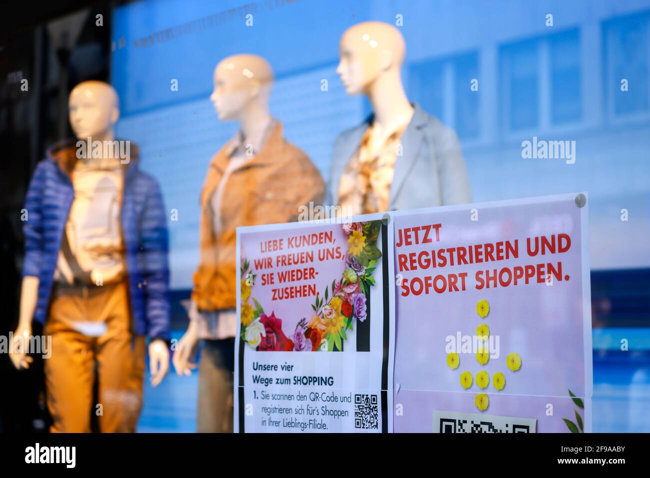 Düren, North Rhine-Westphalia, Germany - Düren city center in times of the corona crisis with the second lockdown, most shops are closed, Galeria Kaufhof Karstadt advertises in the Click & Meet shop window, register online and make a shopping appointment. Stock Photo