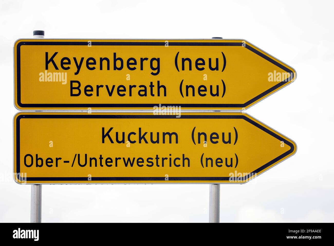 Erkelenz, North Rhine-Westphalia, Germany - Street sign to the relocation site for Keyenberg, Kuckum, Unterwestrich, Oberwestrich and Berverath, the places had to give way to the RWE open-cast lignite mine in Garzweiler, RWE Power is developing the new residential area together with the city of Erkelenz. Stock Photo
