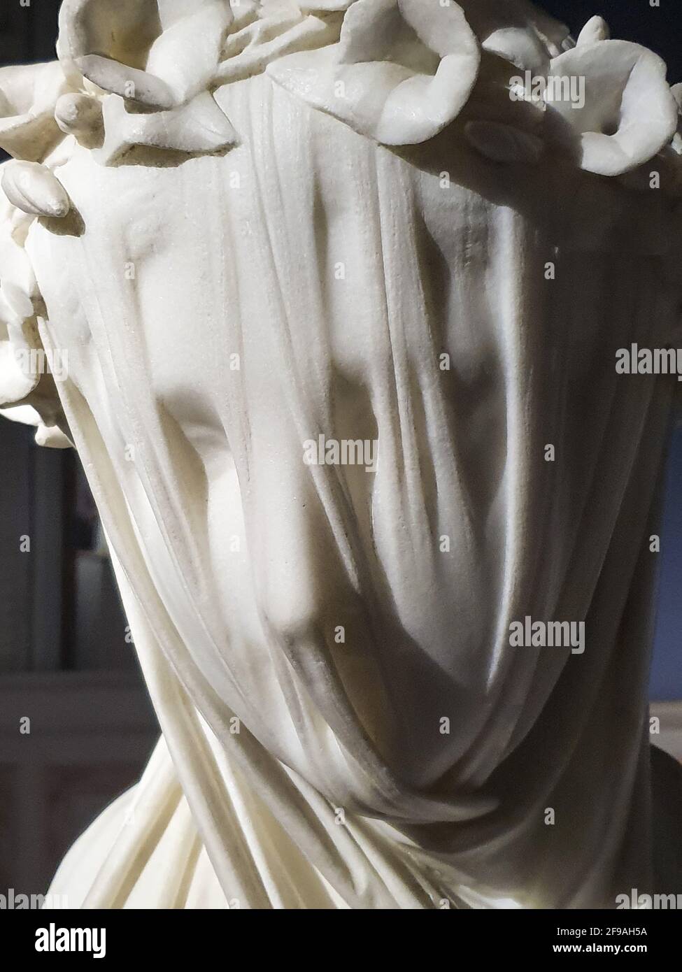 White marble sculpture of a young Veiled Lady by Raffaele Monti in the