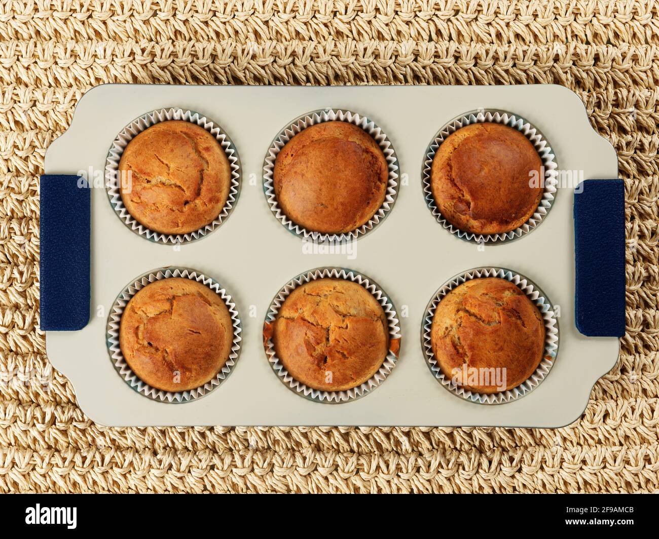 Homemade banana mini bundt cakes on a cooling rack. No sugar added. Healthy toddler food Stock Photo