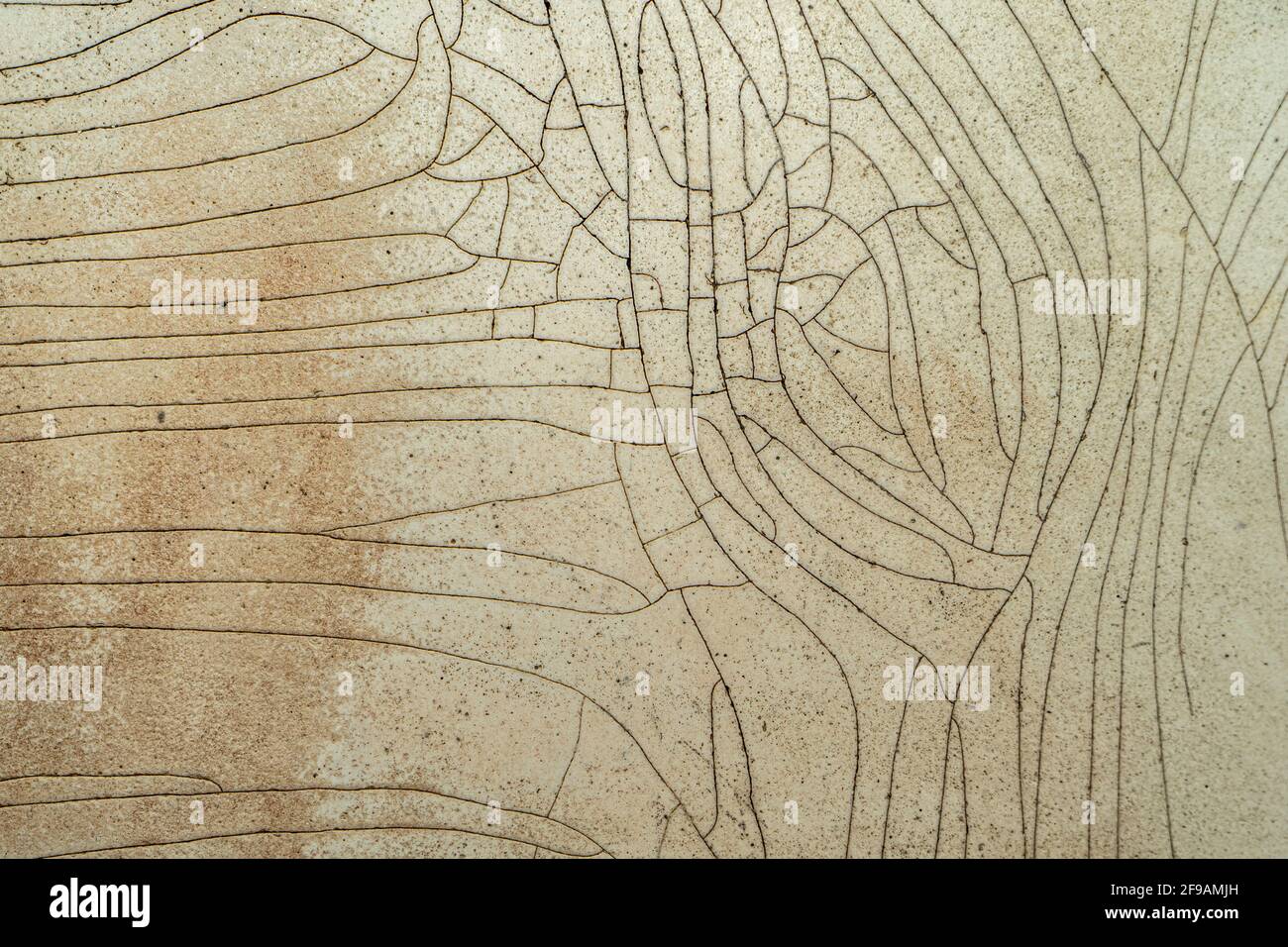 The old cracked and worn surface of the tub. Cracked shell coating