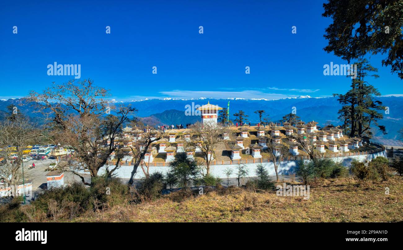 The Druk Wangyal Chortens, as they are called, has been built in 3 concentric circles. The lowermost circle has 45 Chortens while the topmost has 27. Stock Photo