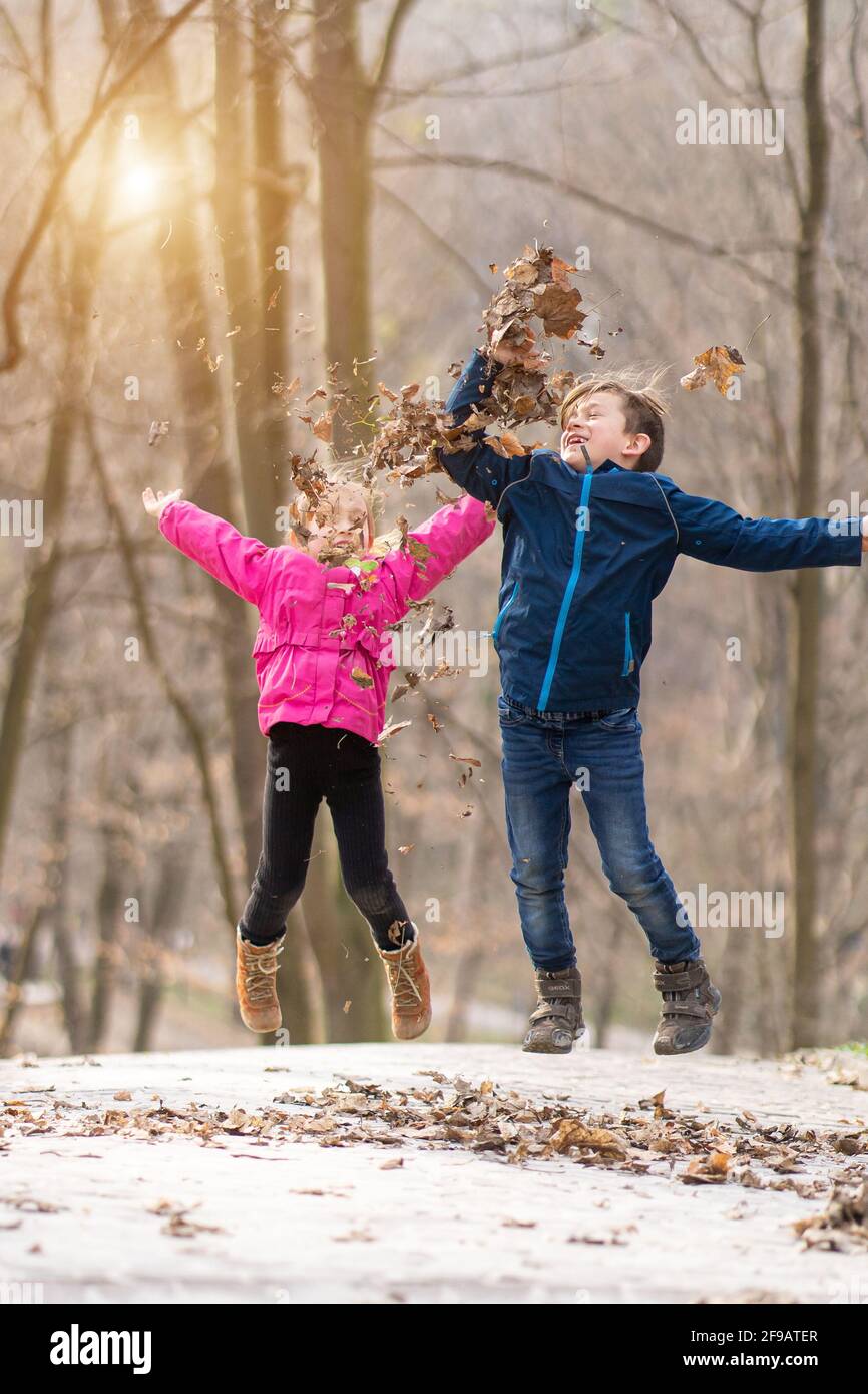 Cute Little Children Playing Together Preschooler Boy And Girl Best Friends Toddler Siblings Together On Nature Kids In Sunny Spring Park Stock Photo Alamy