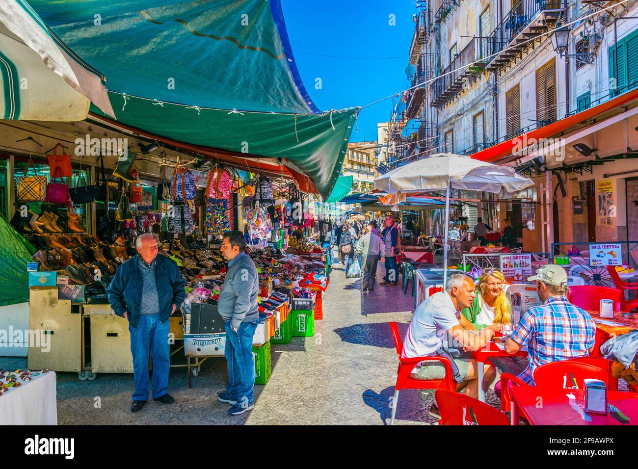 PALERMO, ITALY, APRIL 23, 2017: People are strolling through Mercato di Ballaro in Palermo, Sicily, Italy Stock Photo