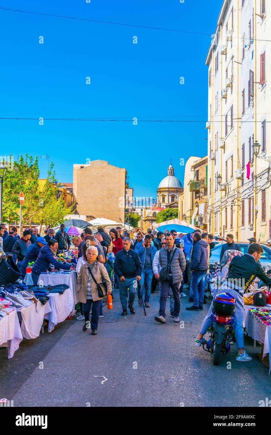 PALERMO, ITALY, APRIL 23, 2017: People are strolling through Mercato di Ballaro in Palermo, Sicily, Italy Stock Photo