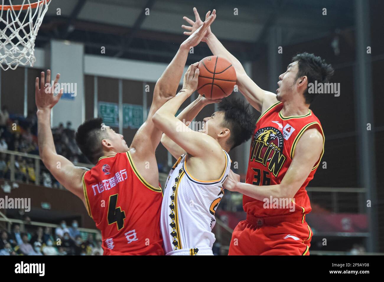 Zhuji, China's Zhejiang Province. 17th Apr, 2021. Wu Xiao (C) of Zhejiang Lions competes during the 1st round playoff match between Zhejiang Lions and Jilin Northeast Tigers at the 2020-2021 season of the Chinese Basketball Association (CBA) league in Zhuji, east China's Zhejiang Province, April 17, 2021. Credit: Jiang Han/Xinhua/Alamy Live News Stock Photo