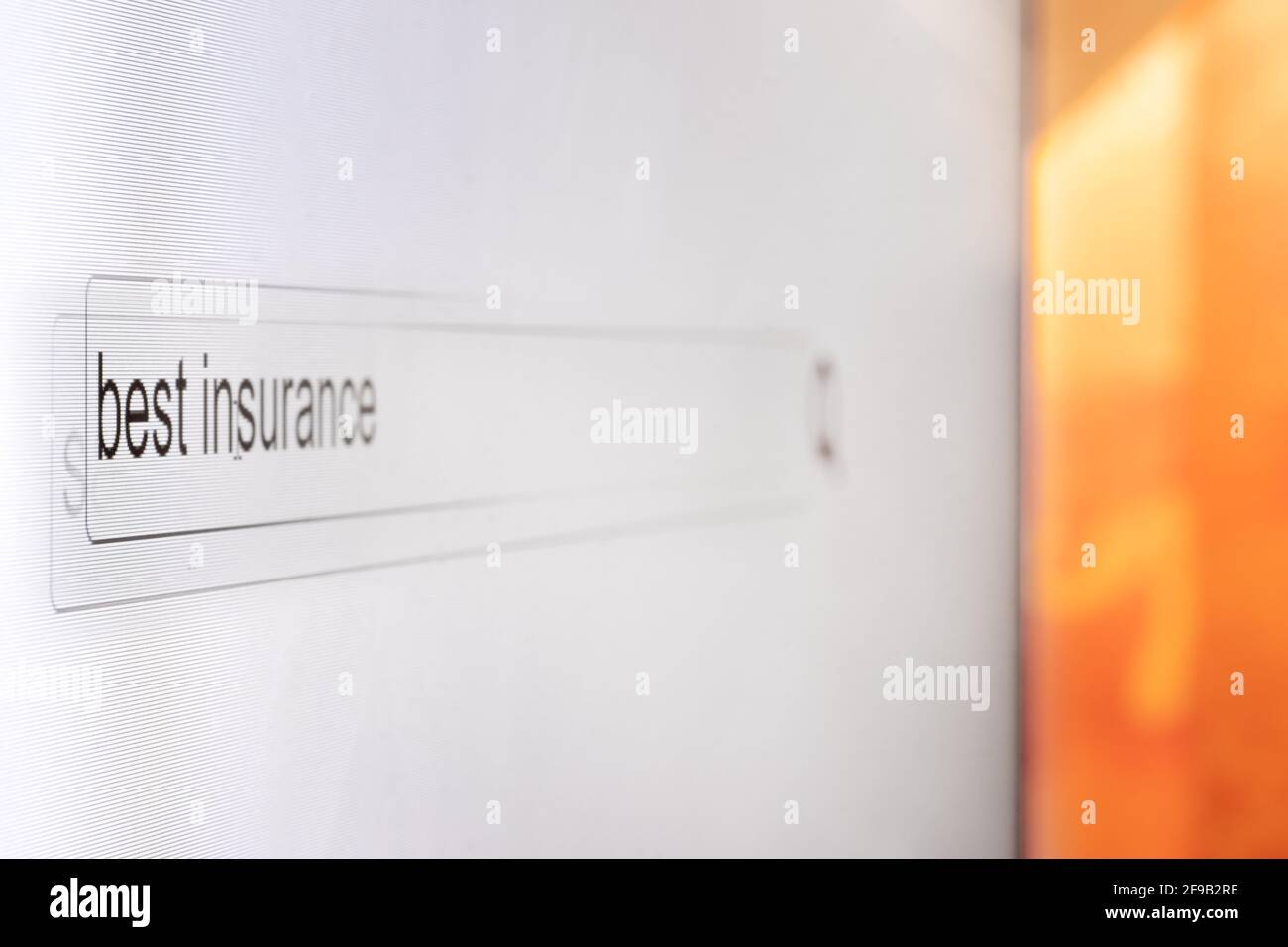 Search bar on a computer monitor with the question Best insurance. Searching for information on the Internet, close up. Stock Photo