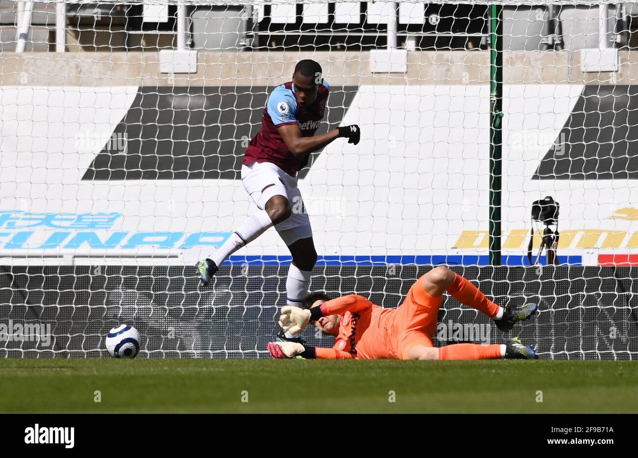 West Ham United's Issa Diop scores an own goal during the Premier League match at St James' Park, Newcastle. Picture date: Saturday April 17, 2021. Stock Photo