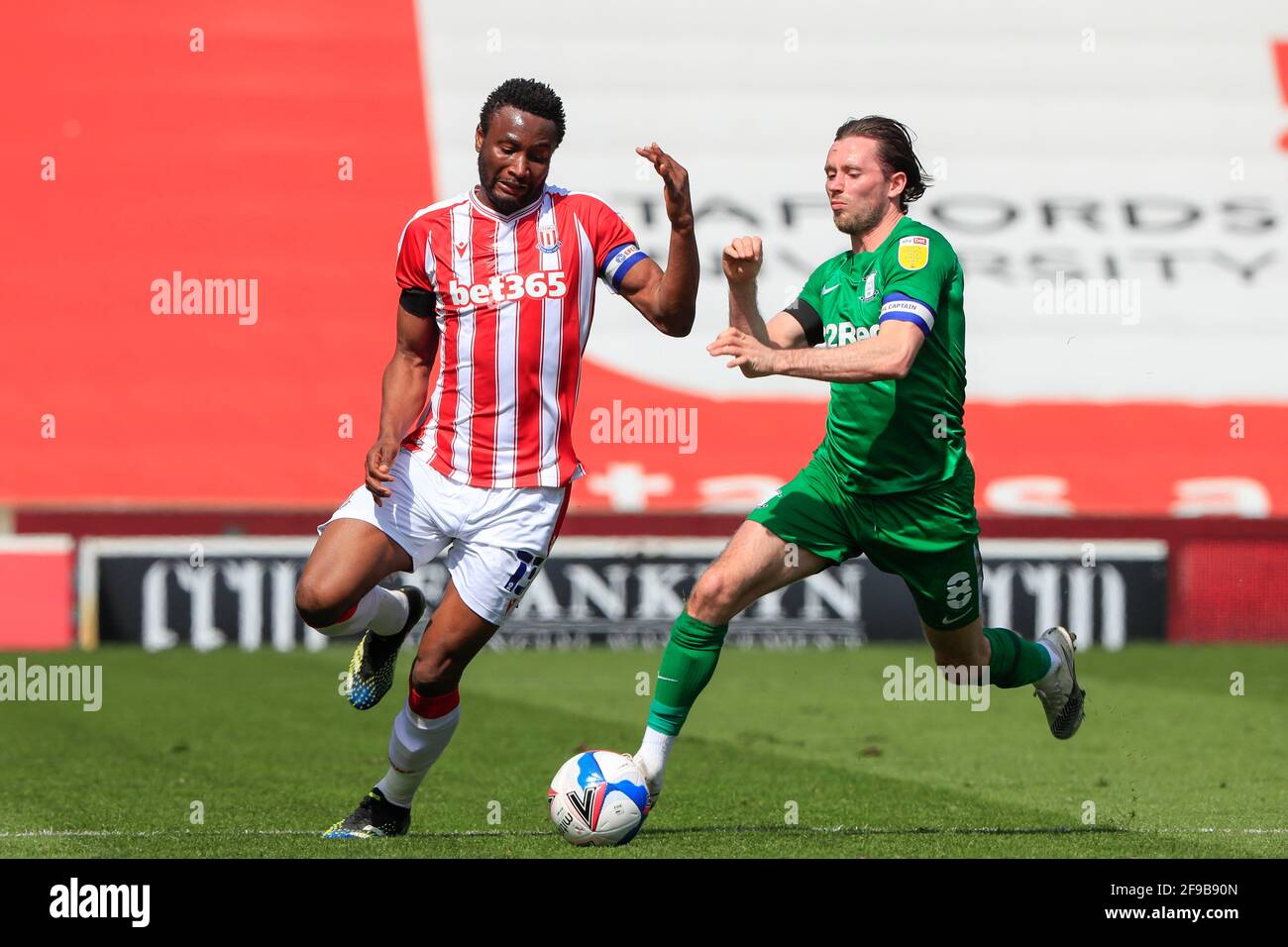 John Obi Mikel #13 of Stoke City and Alan Browne #8 of Preston North End challenge for the ball in Stoke-on-Trent, UK on 4/17/2021. (Photo by Conor Molloy/News Images/Sipa USA) Stock Photo