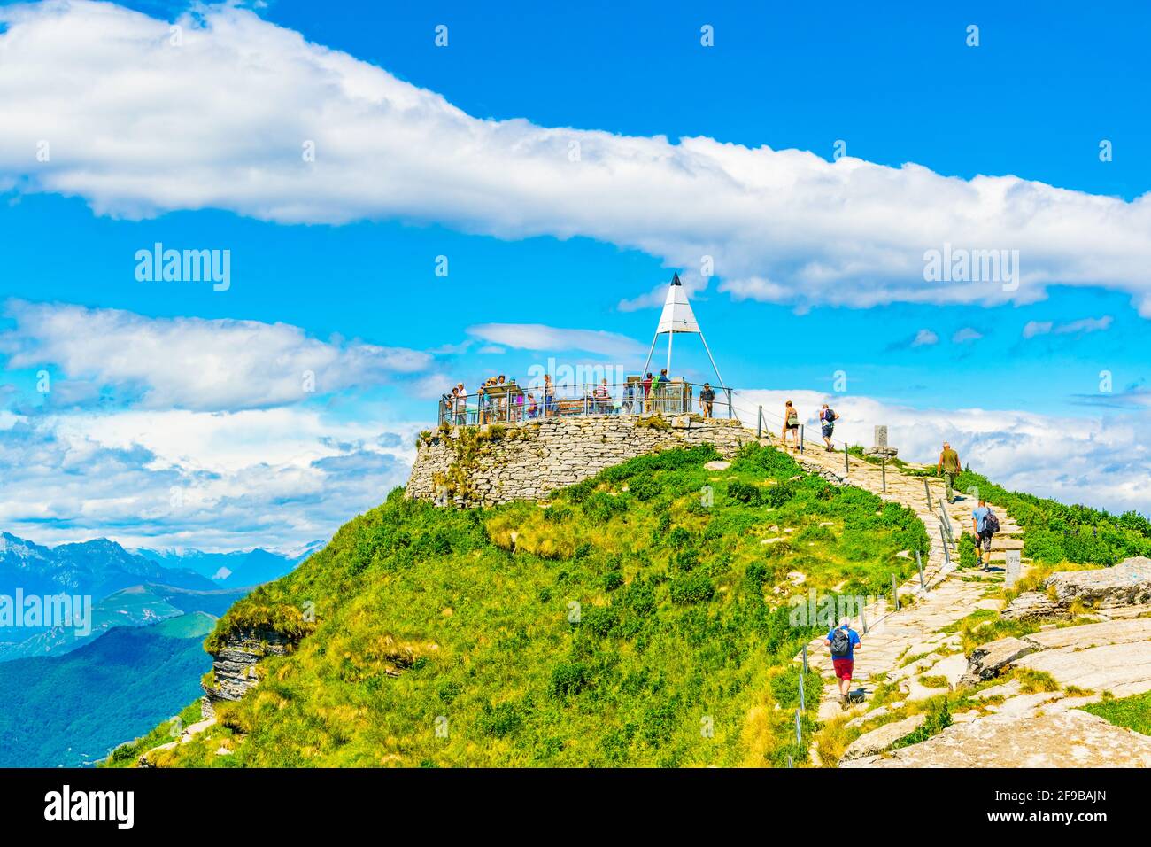 LUGANO, SWITZERLAND, JULY 25, 2017: Tourists are strolling on top of Monte Generoso in Switzerland Stock Photo