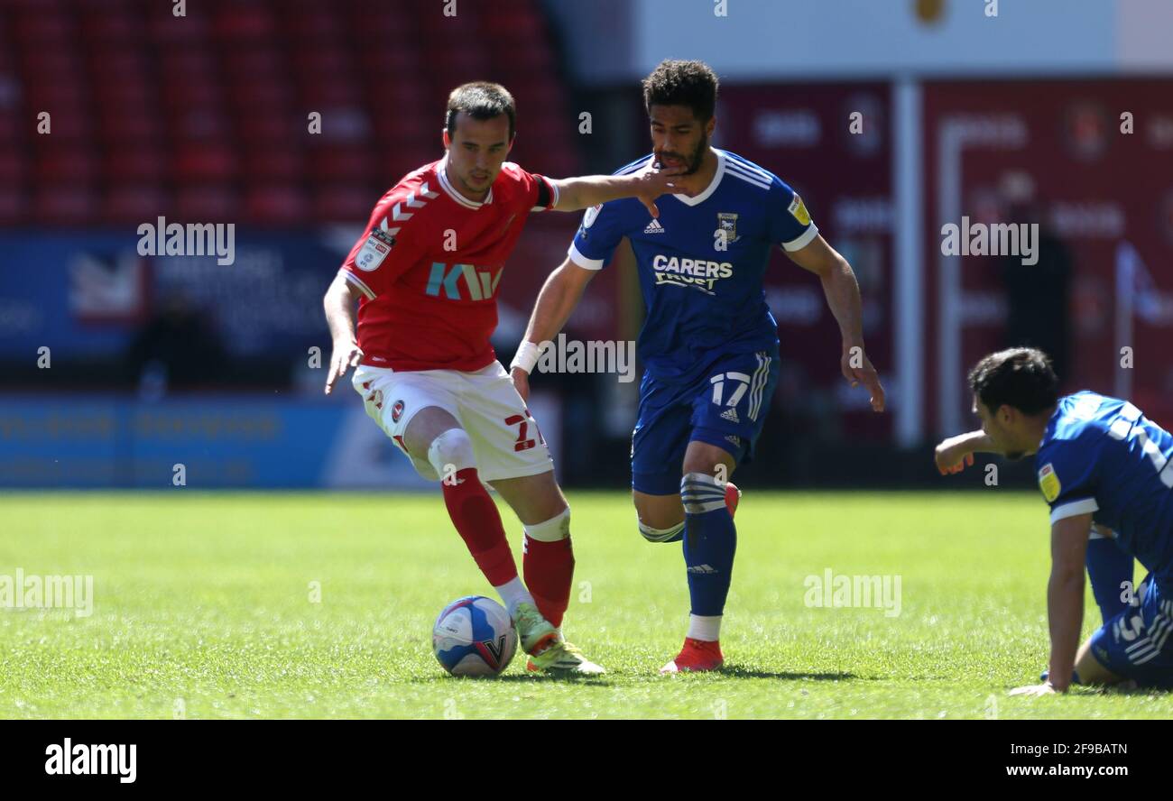 Charlton Athletic's Liam Millar (left) and Ipswich Town's Keanan Bennetts (right) battle for the ball during the Sky Bet League One match at The Valley, London. Picture date: Saturday April 17, 2021. Stock Photo