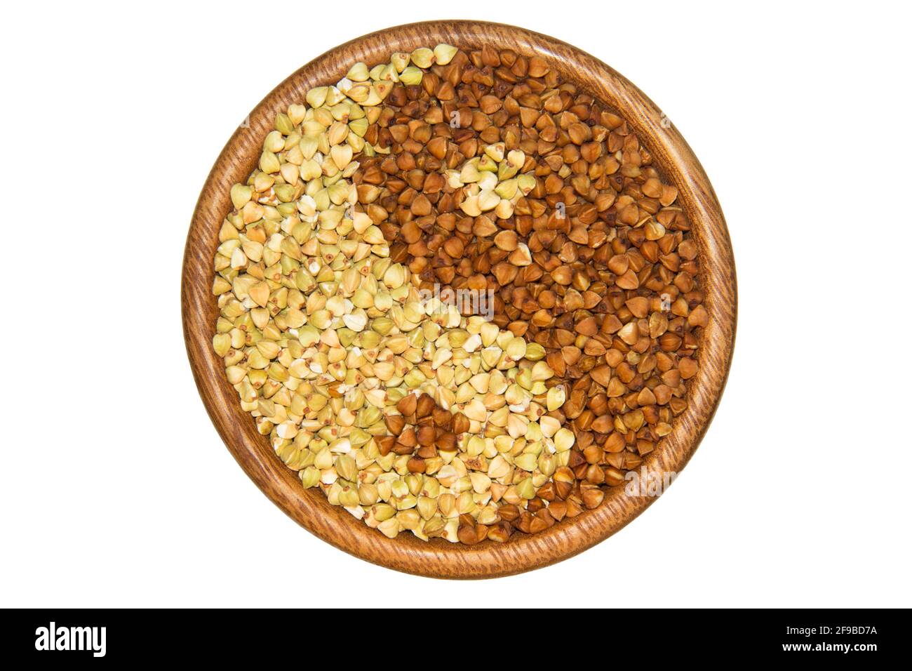 Green buckwheat and brown isolated on white background. Healthy and organic food. Image cut and placed on a white background. Stock Photo