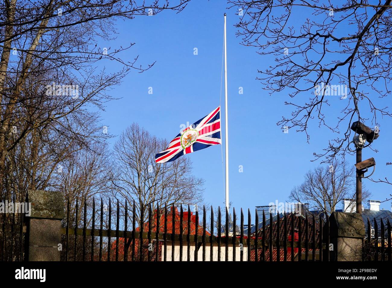 Helsinki, Finland. 17th April, 2021. Duke of Edinburgh Funeral Day. British diplomatic flag fly at half mast as a sign of respect to the passing of HRH Prince Philip, aged 99 on 9th April 2021, outside the British Embassy in Helsinki, Finland. Credit: Taina Sohlman Stock Photo